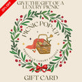 Gift card for Asheville Luxury Picnics with a picnic basket and wreath design on a beige background.